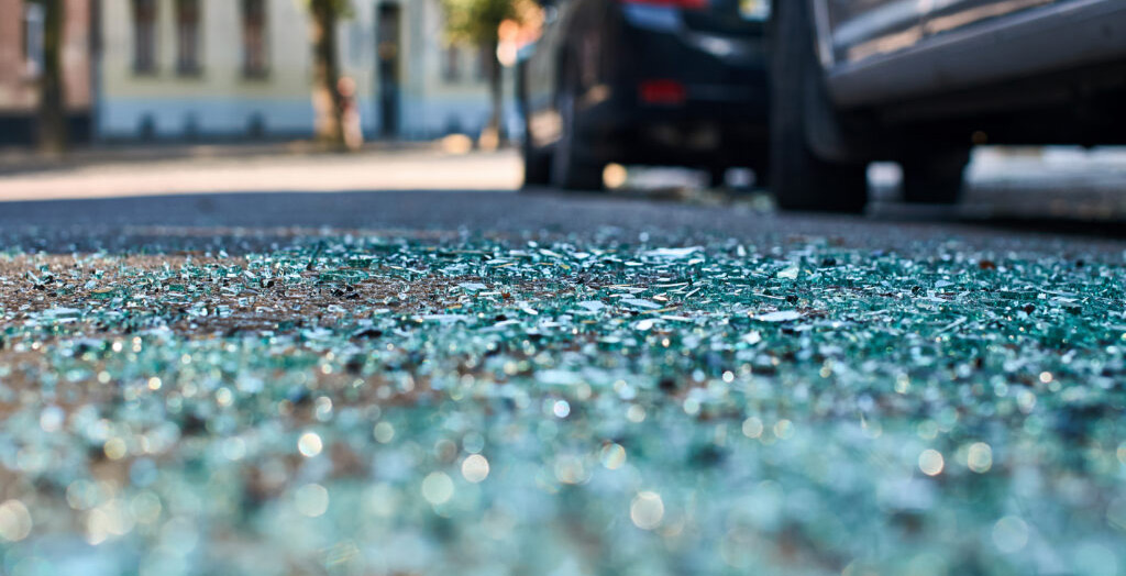 car accident crash scene of broken glass to represent car accident lawyers in bakersfield